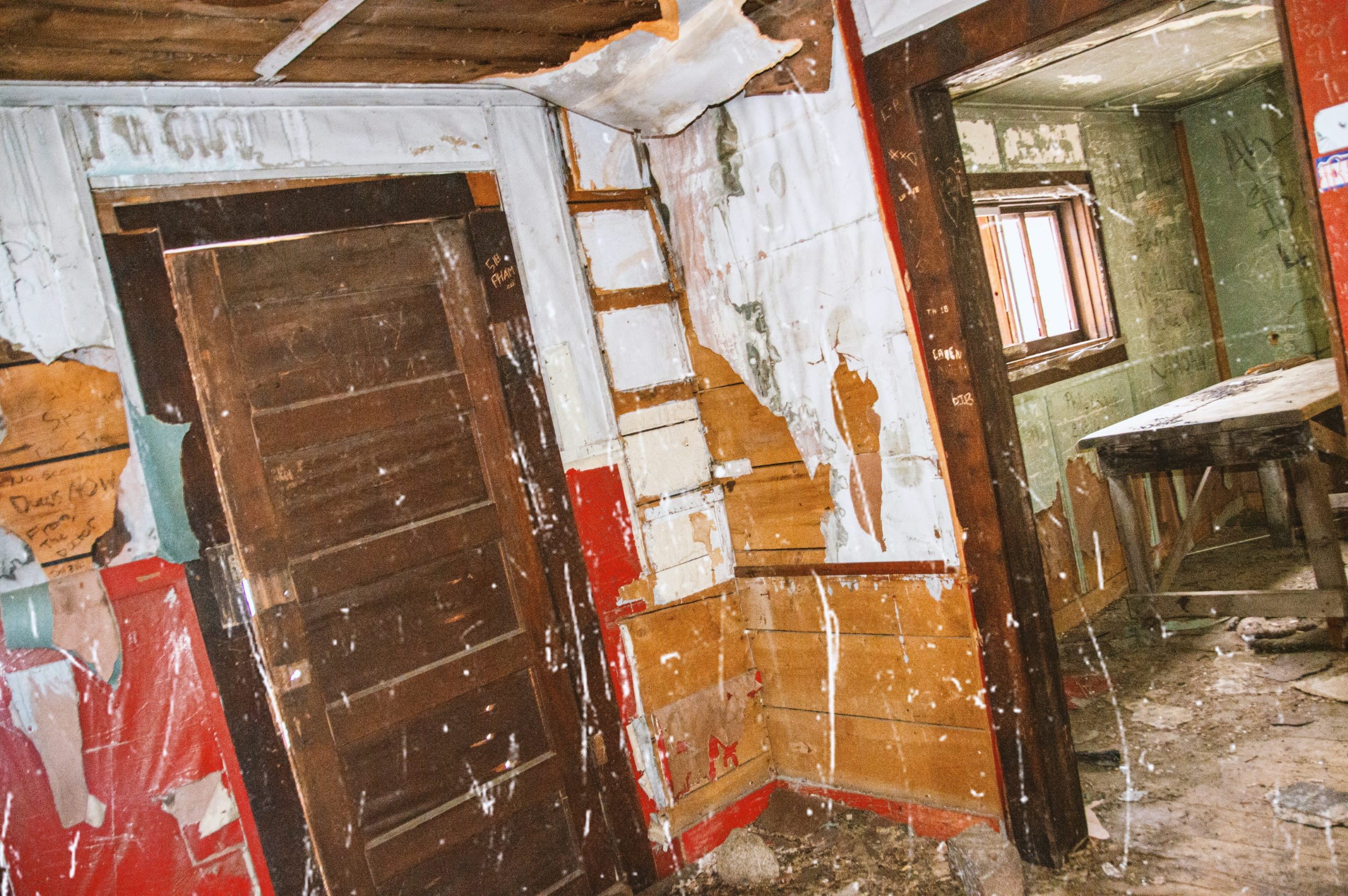 Before and after photos showing the impact of improper asbestos removal during renovation.